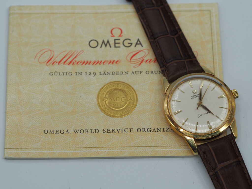 Omega Seamaster Ref. OT 14704, 750/18K Gold, Kaliber 591, mit Papieren aus 1962